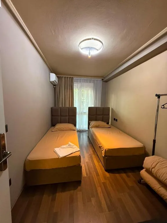 Twin Room — Noon Central Hotel